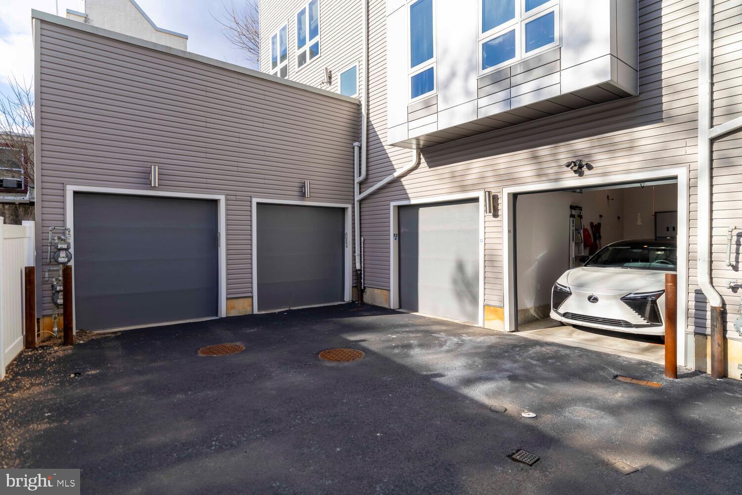 1224 North 26th Street, Unit F1 Philadelphia, PA 19121 - Photo 25 of 25 Modern garage with sleek design and ample space.