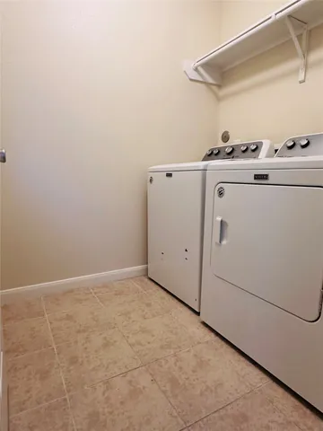 a view of outdoor space with wooden fence