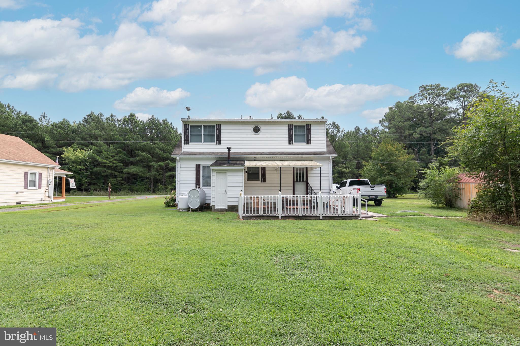 5614 Casson Neck Cambridge, MD 21613 - Photo 5 of 38 a view of a house with a back yard