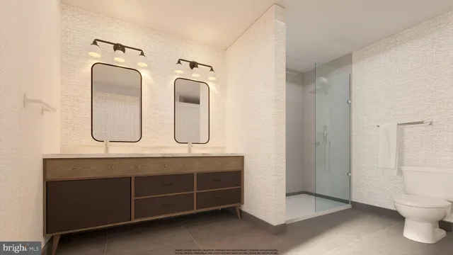 a bathroom with a double vanity sink mirror and toilet
