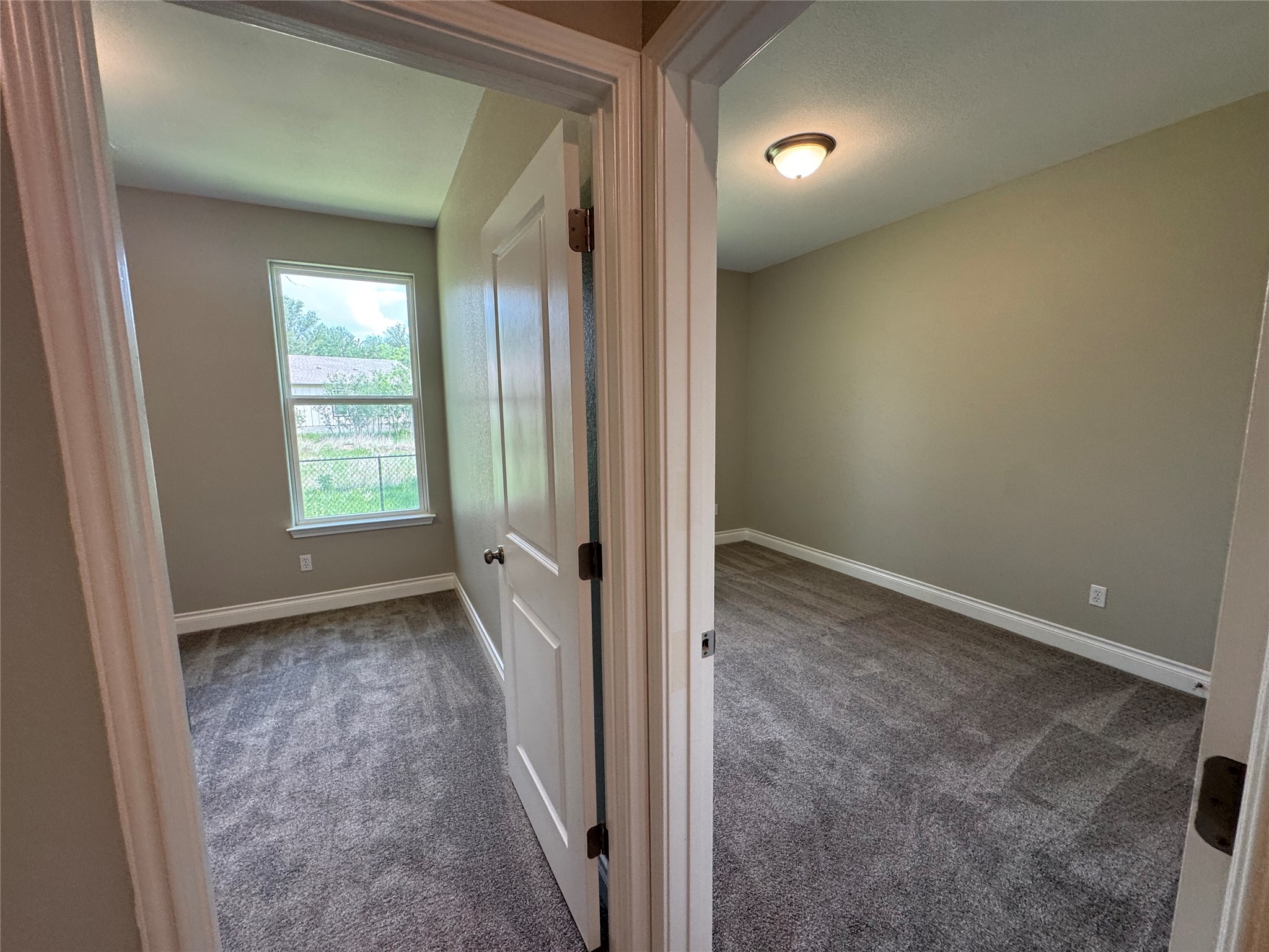 109 Mokulua Bastrop, TX 78602 - Photo 28 of 32 wooden floor in an empty room and a window
