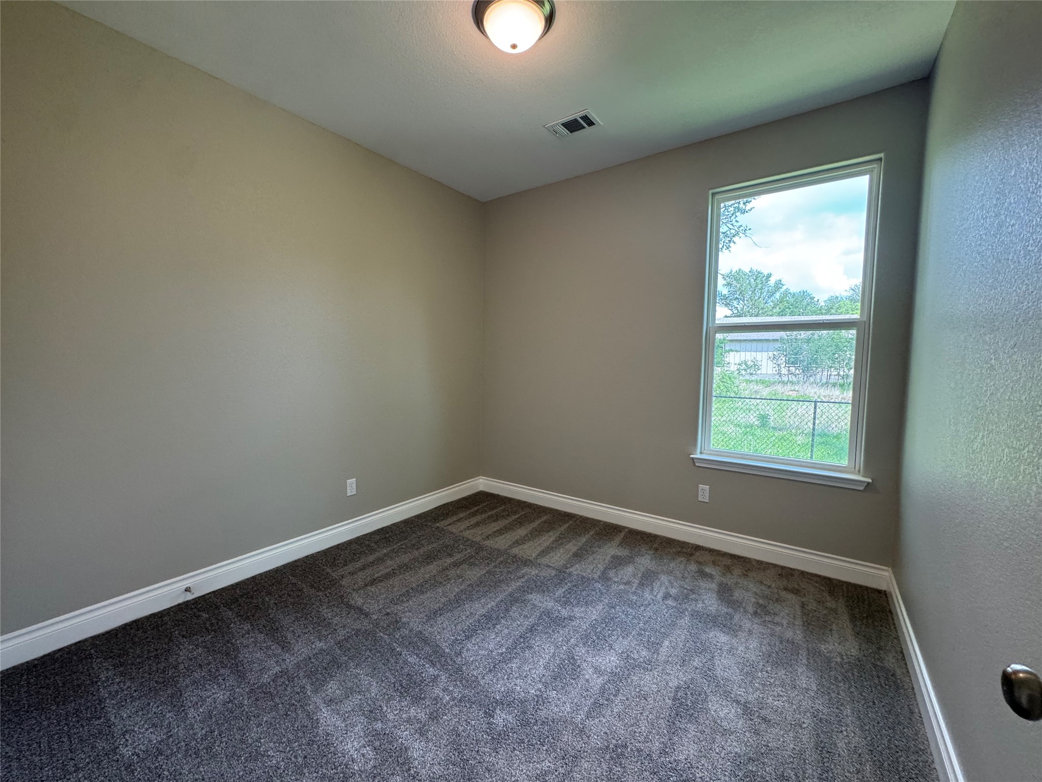 109 Mokulua Bastrop, TX 78602 - Photo 30 of 32 an empty room with a window