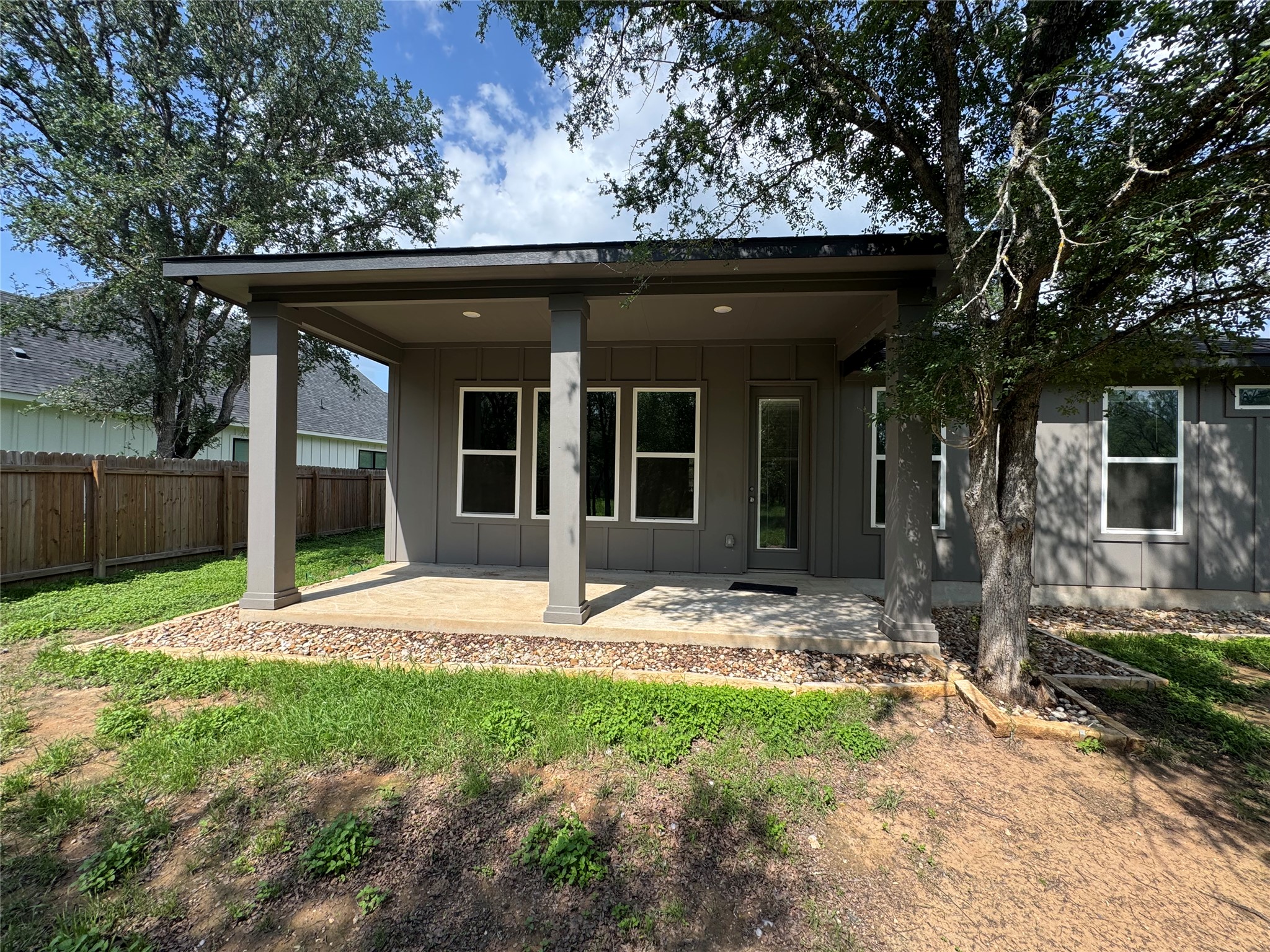109 Mokulua Bastrop, TX 78602 - Photo 4 of 32 a front view of a house with garden