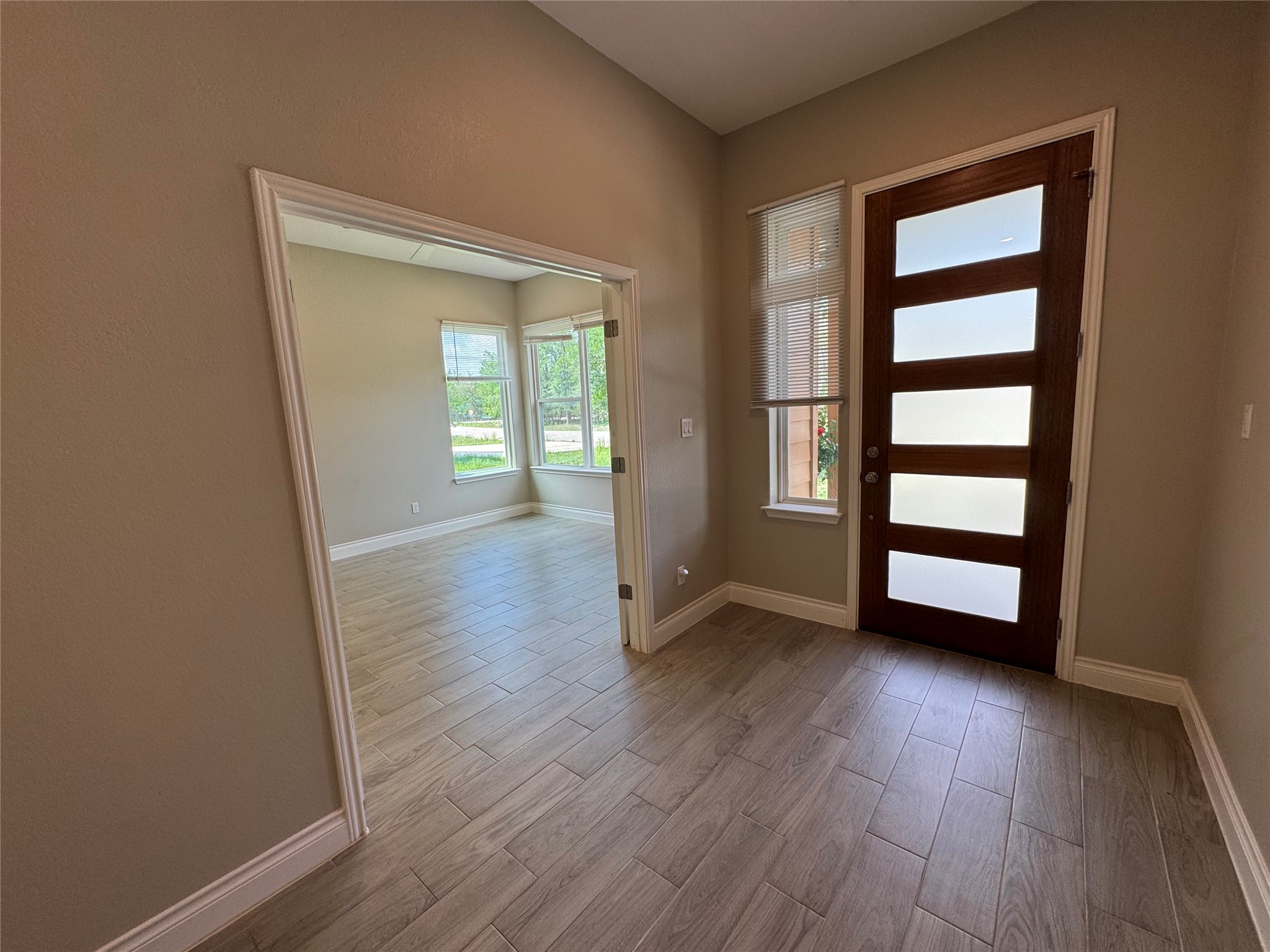 109 Mokulua Bastrop, TX 78602 - Photo 9 of 32 an empty room with wooden floor and closet