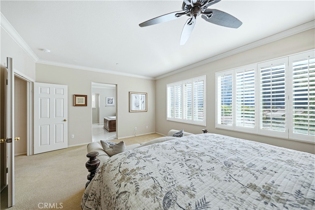 10 Boulder Ridge Court Azusa, CA 91702 - Photo 24 of 50 a bedroom with a large bed and a window