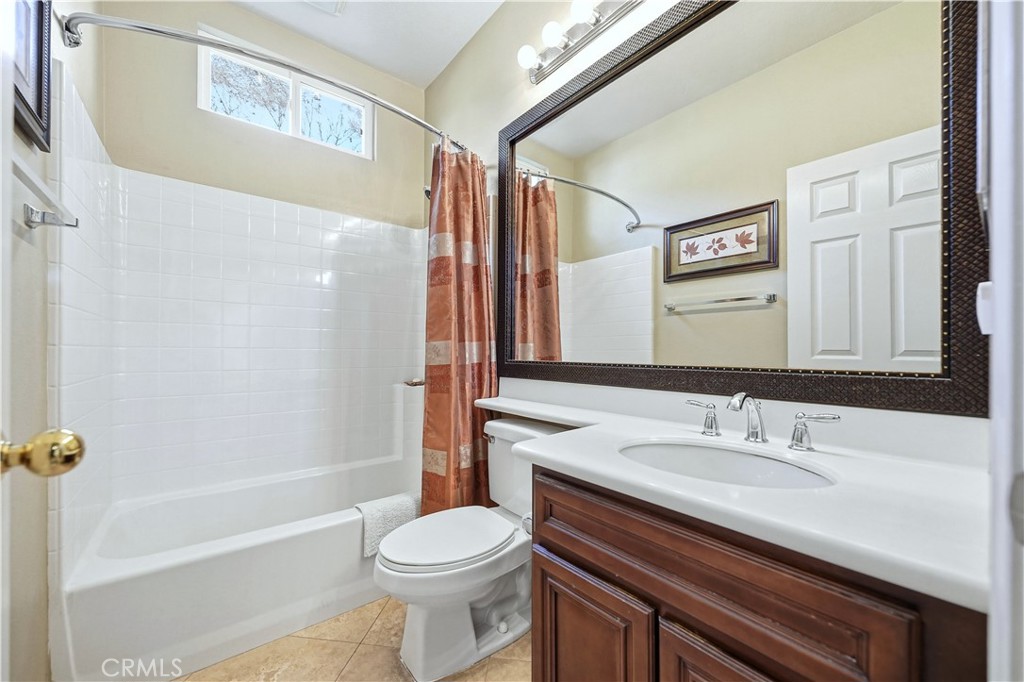 10 Boulder Ridge Court Azusa, CA 91702 - Photo 33 of 50 a bathroom with a sink a toilet and shower