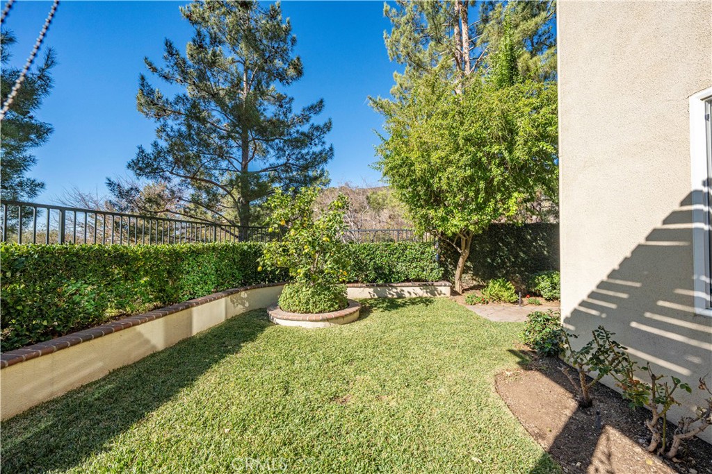 10 Boulder Ridge Court Azusa, CA 91702 - Photo 39 of 50 a view of a backyard with plants and lake