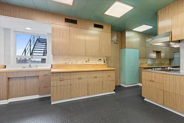 a bathroom with a double vanity sink mirror and