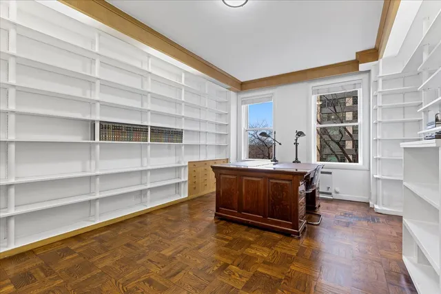 a living room with a furniture and a window