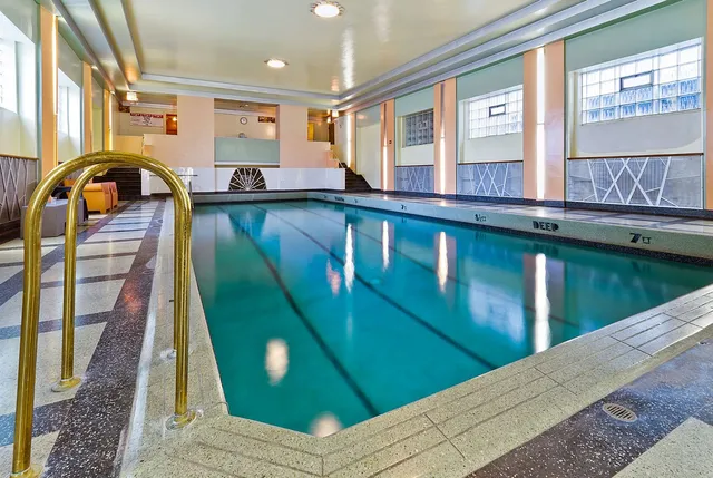 a kitchen with lots of counter space and windows