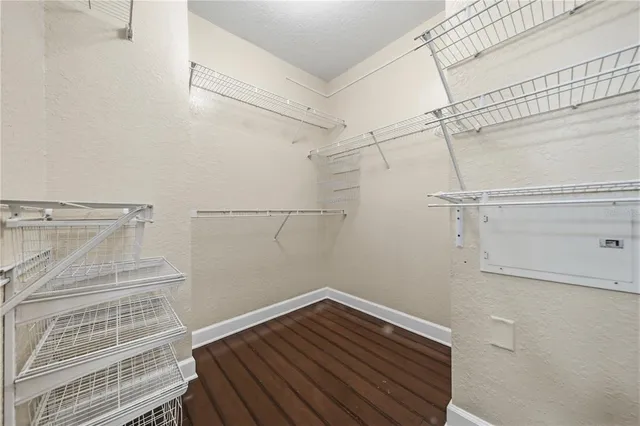 a view of a room with racks on the wall