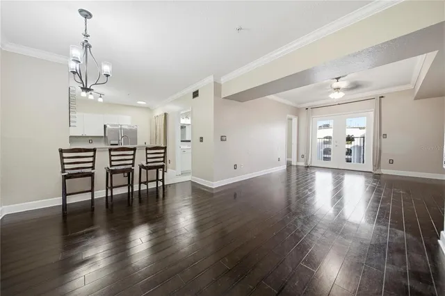 a view of a livingroom with furniture and wooden floor
