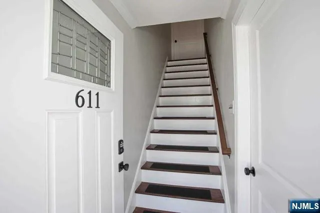 a view of entryway with stairs