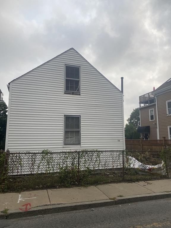 10 Dunmore Street Boston, MA 02119 - Photo 3 of 3 a front view of a house