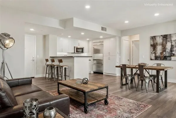 a view of kitchen with wooden floor