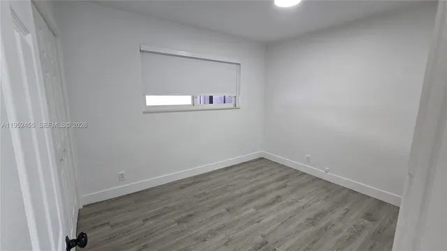 a view of a window in an empty room