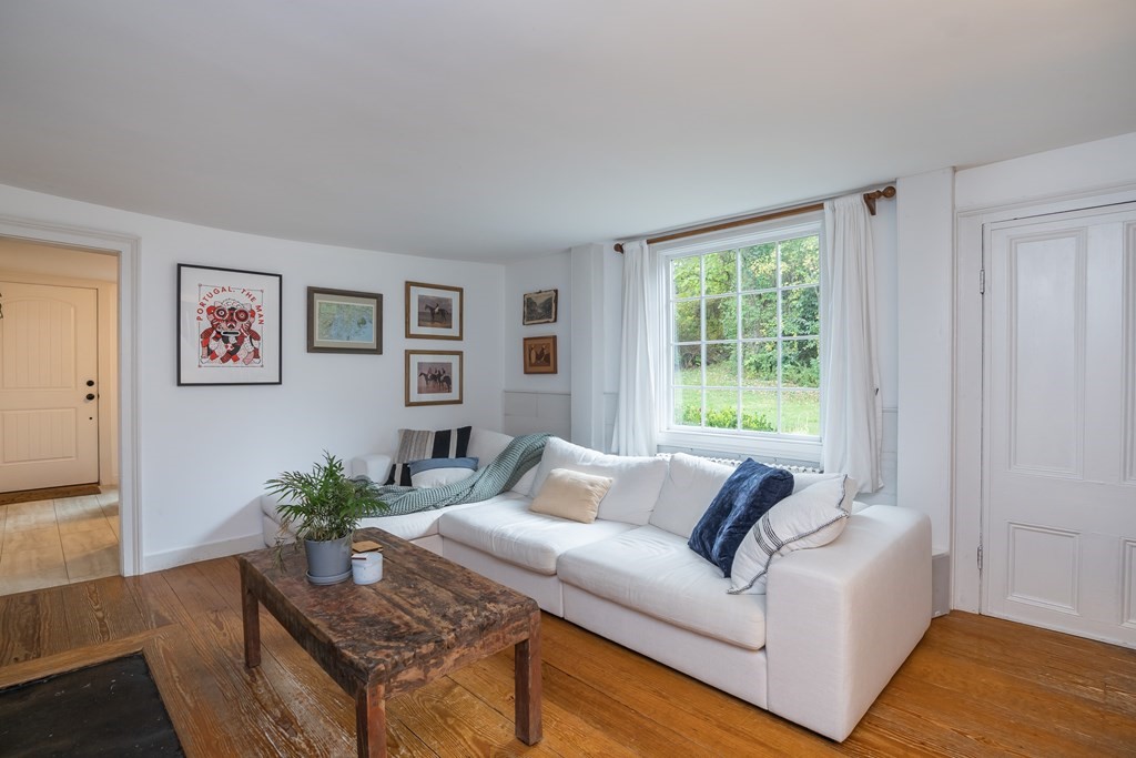 324 Chapin Road Hampden, MA 01036 - Photo 14 of 42 a living room with furniture and a potted plant