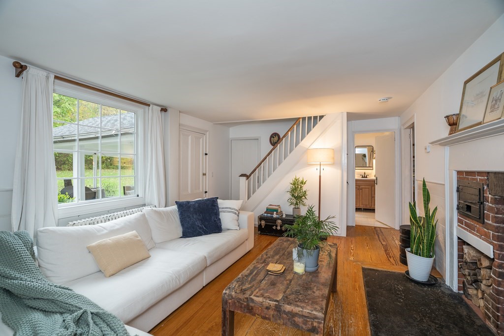 324 Chapin Road Hampden, MA 01036 - Photo 15 of 42 a living room with furniture and a large window