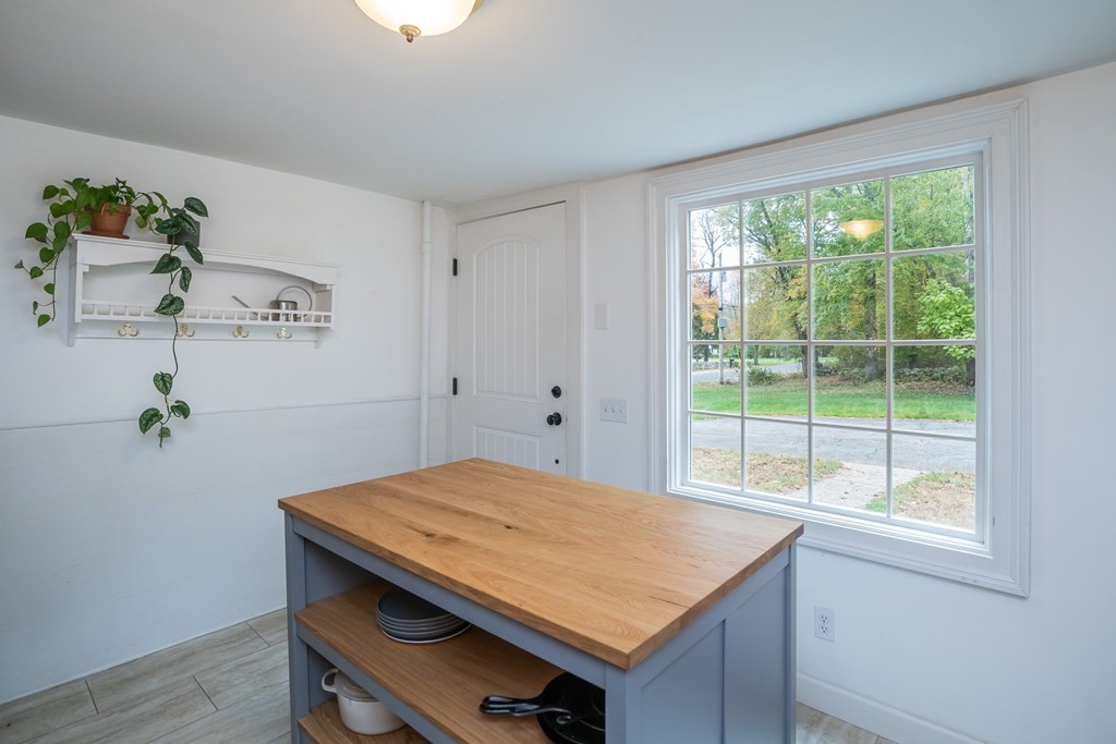 324 Chapin Road Hampden, MA 01036 - Photo 27 of 42 a view of a kitchen that has a table and chair in it