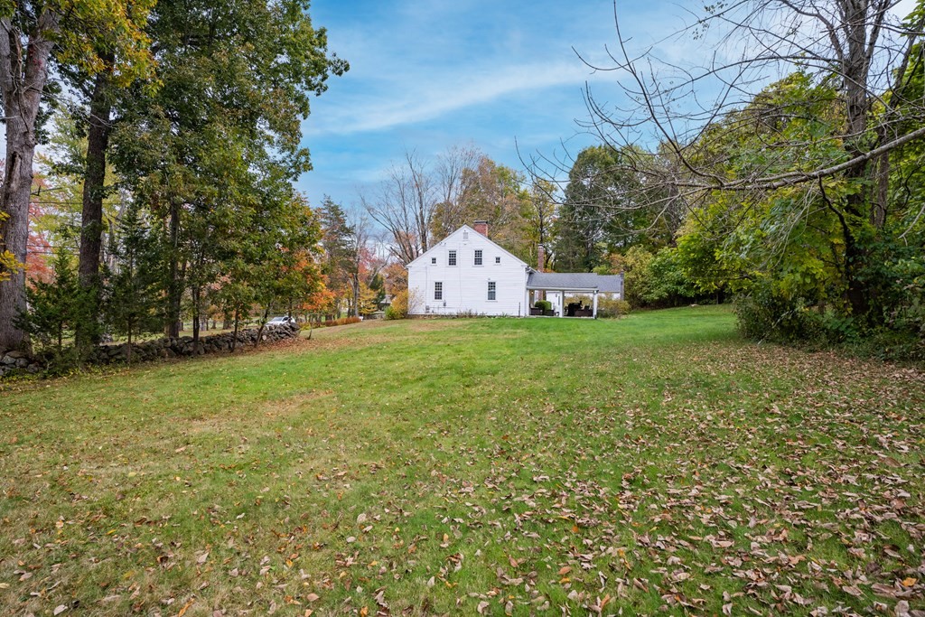 324 Chapin Road Hampden, MA 01036 - Photo 6 of 42 a front view of a house with a yard