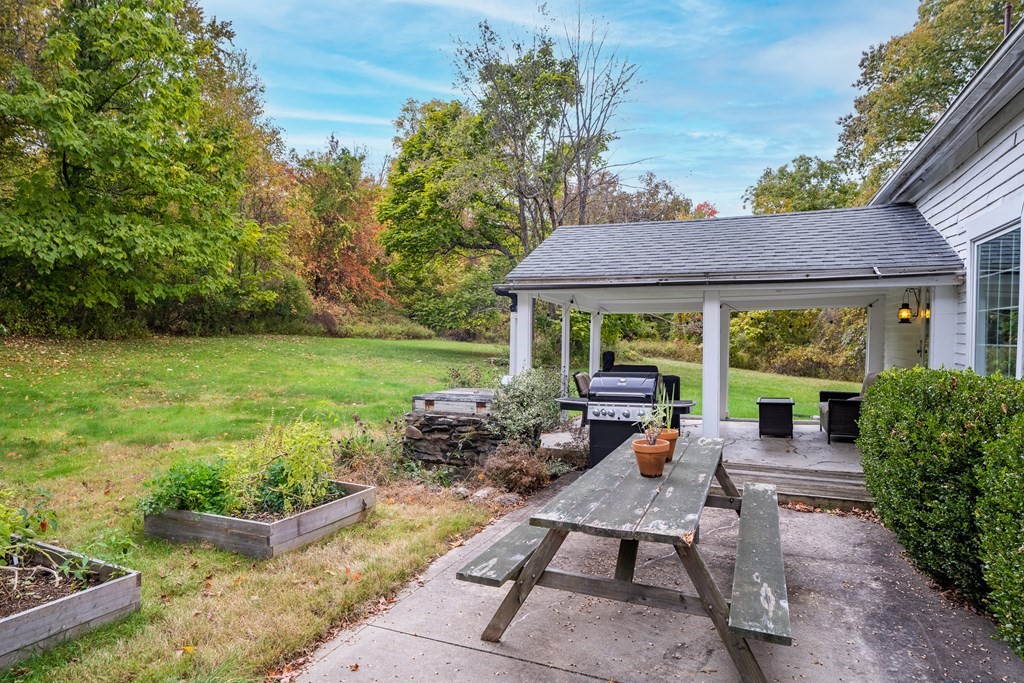 324 Chapin Road Hampden, MA 01036 - Photo 10 of 42 a house view with a seating space and garden