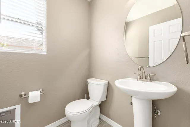 a close view of stove top oven and refrigerator