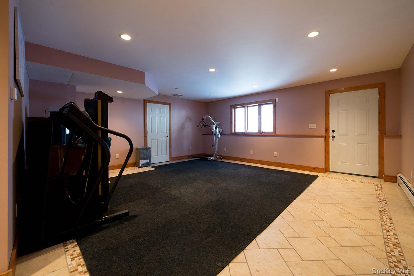 1644 Lakes Road Monroe, NY 10950 - Photo 31 of 49 a view of a room with gym equipment