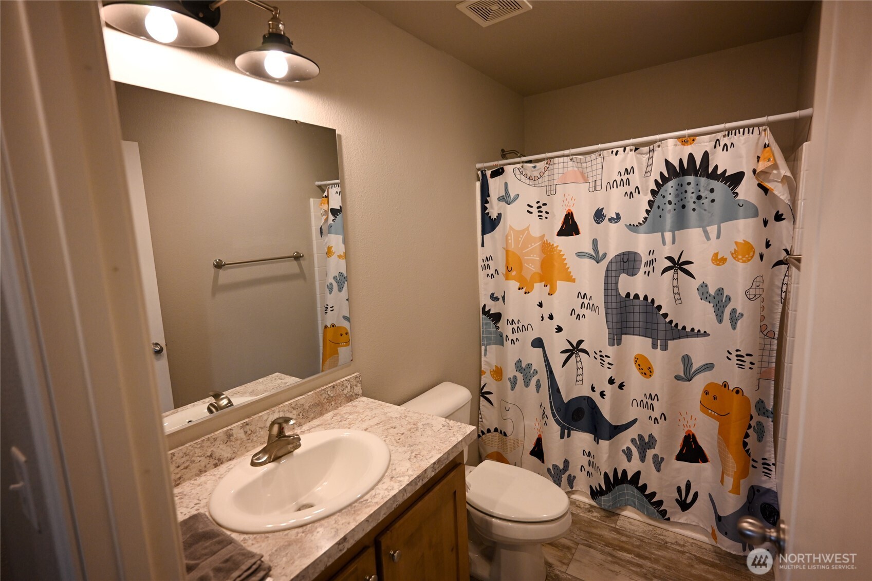 200802 East Game Farm Road, Unit 52 52 Kennewick, WA 99337 - Photo 7 of 12 a bathroom with a sink toilet and shower