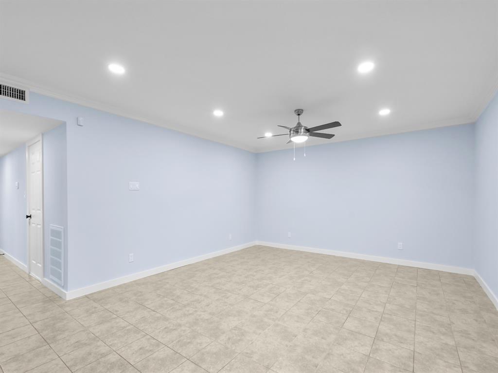 2033 Lymington Road Carrollton, TX 75007 - Photo 13 of 33 Recessed lighting, ceiling fan with light kit, crown molding, and tiled flooring