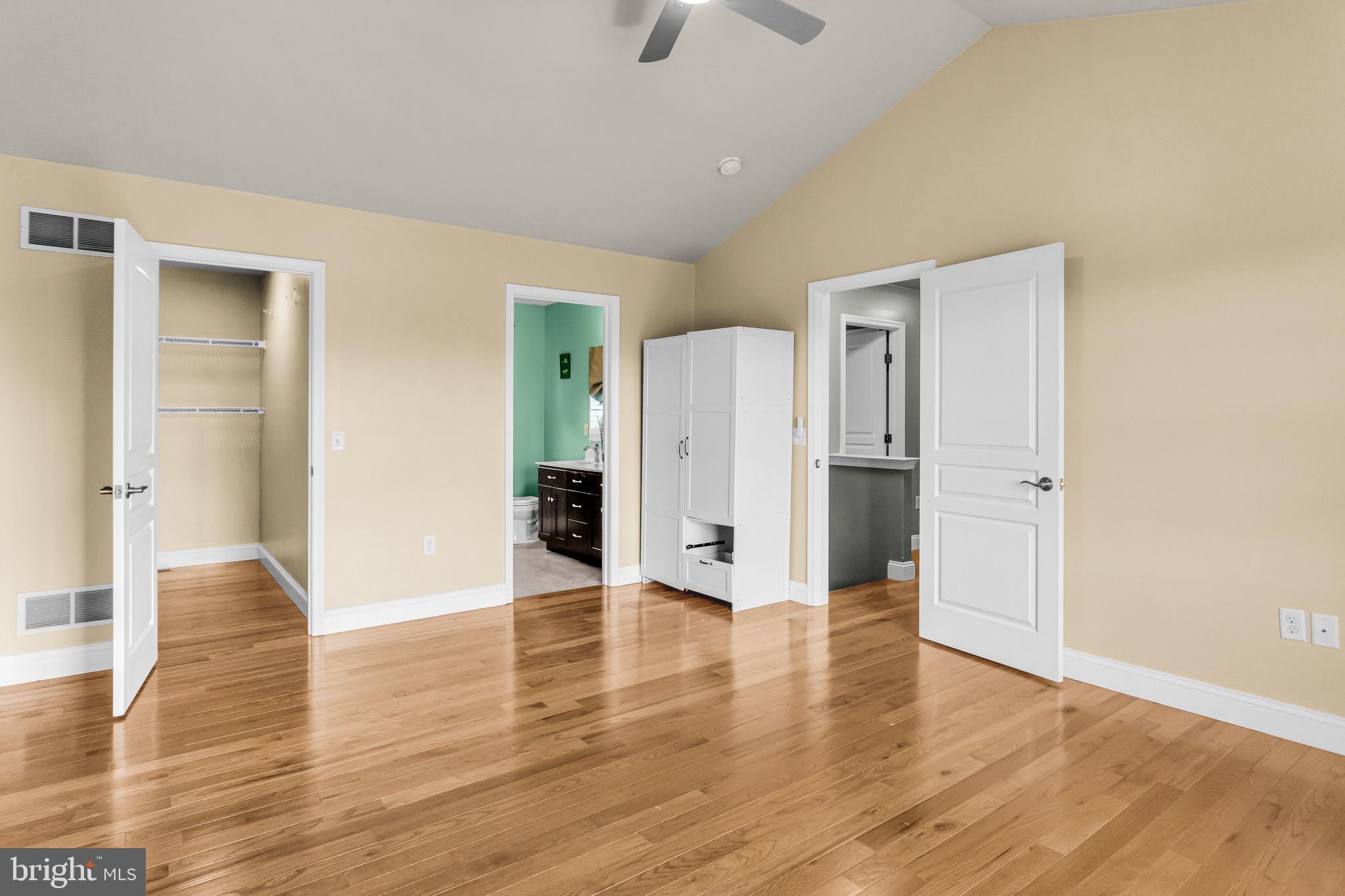25 Springbrook Drive Palmyra, PA 17078 - Photo 21 of 34 a view of an empty room with wooden floor and a ceiling fan