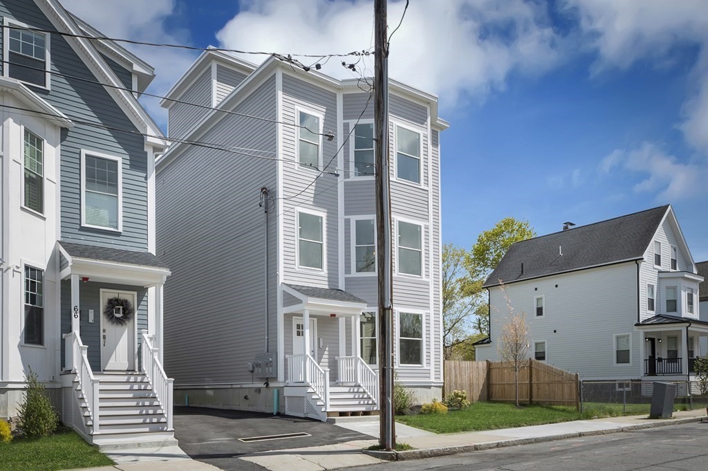 68 Edson Street, Unit 1 Boston, MA 02124 - Photo 3 of 23 a view of a building with a street