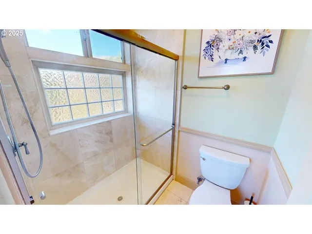 a bathroom with a sink and a shower