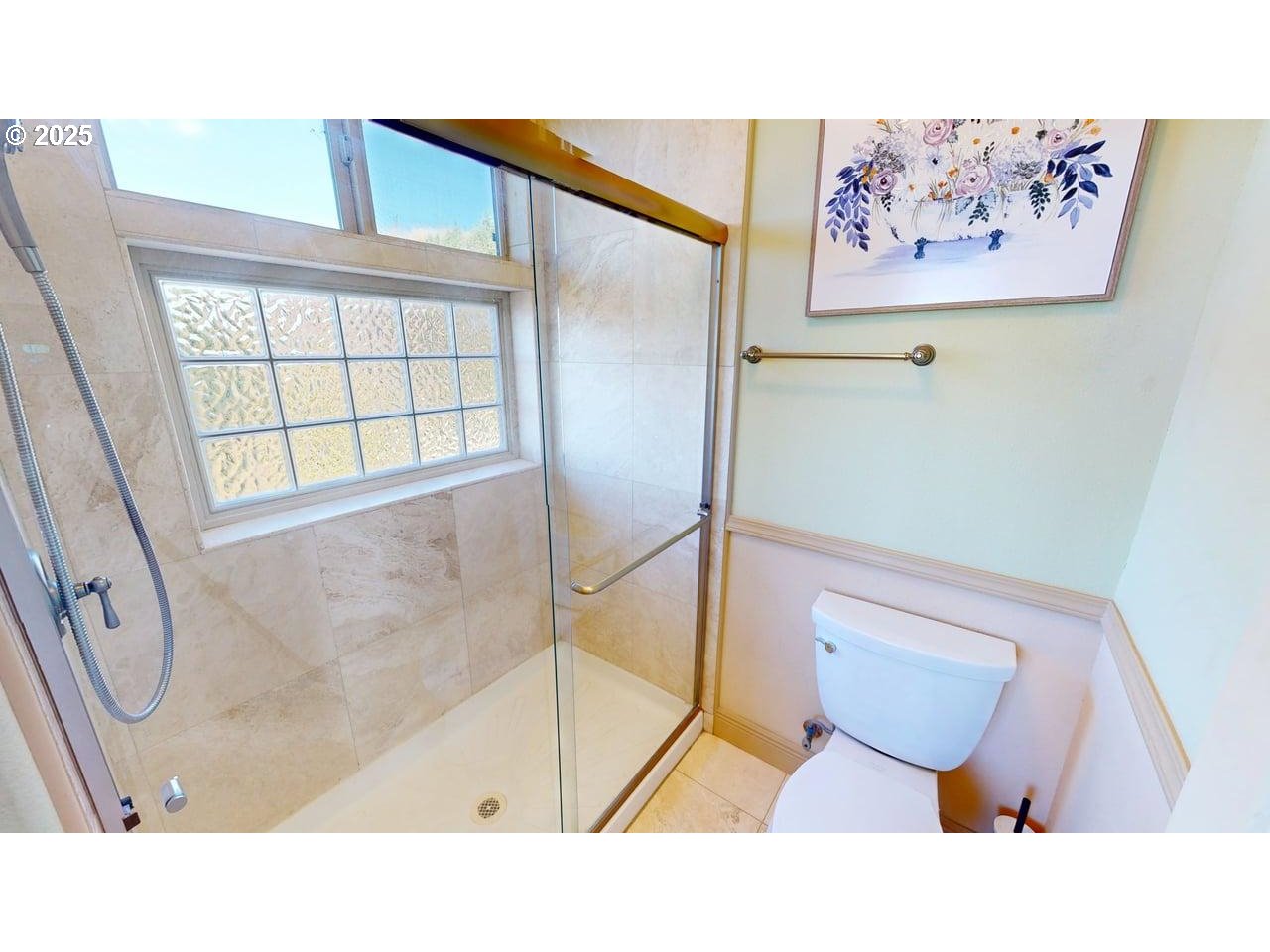 16898 Crown Terrace Brookings, OR 97415 - Photo 18 of 42 a bathroom with a sink and a shower