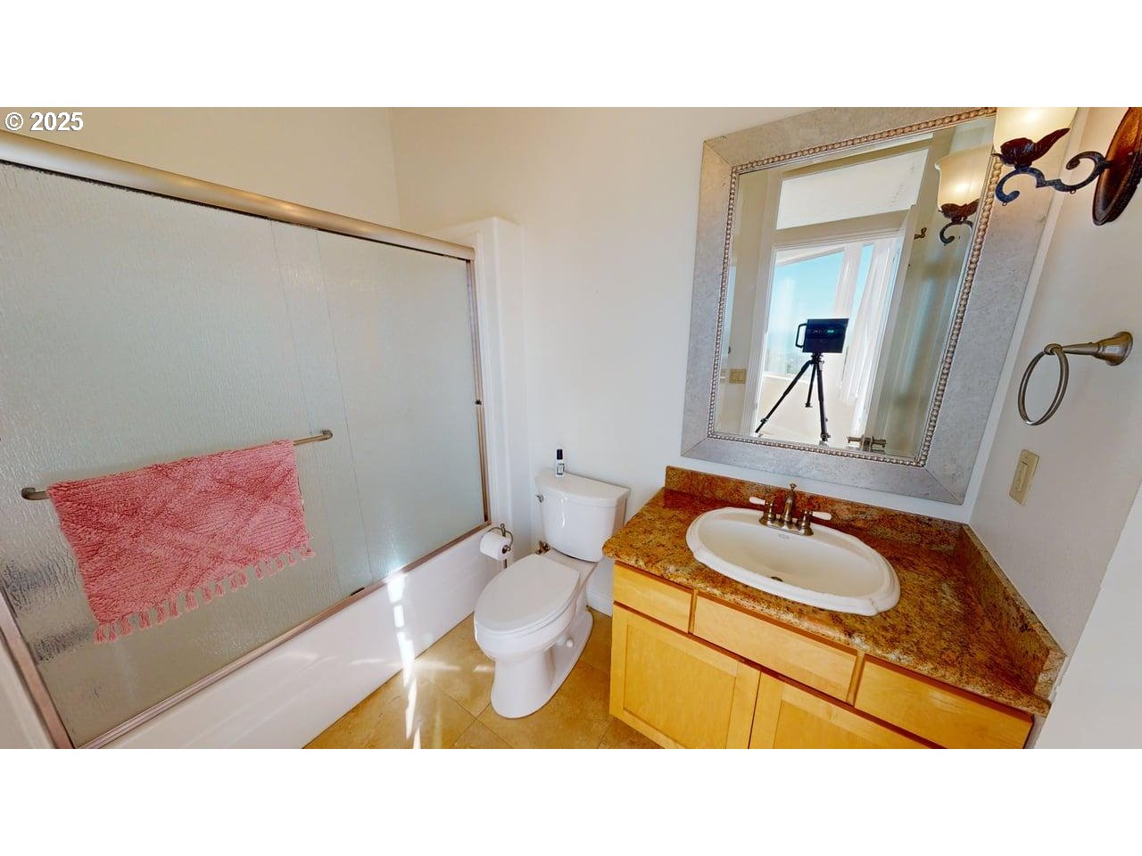 16898 Crown Terrace Brookings, OR 97415 - Photo 24 of 42 a bathroom with a sink mirror vanity and toilet