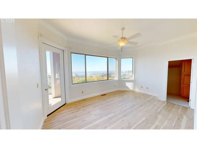 a bathroom with a sink and a large window