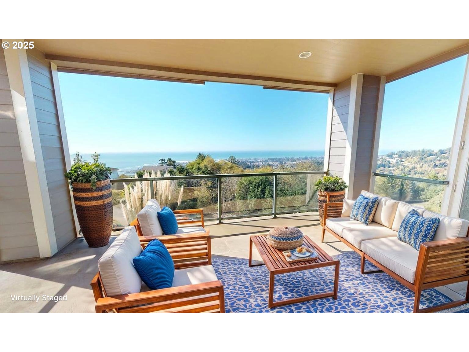 16898 Crown Terrace Brookings, OR 97415 - Photo 31 of 42 a living room with patio furniture and a potted plant