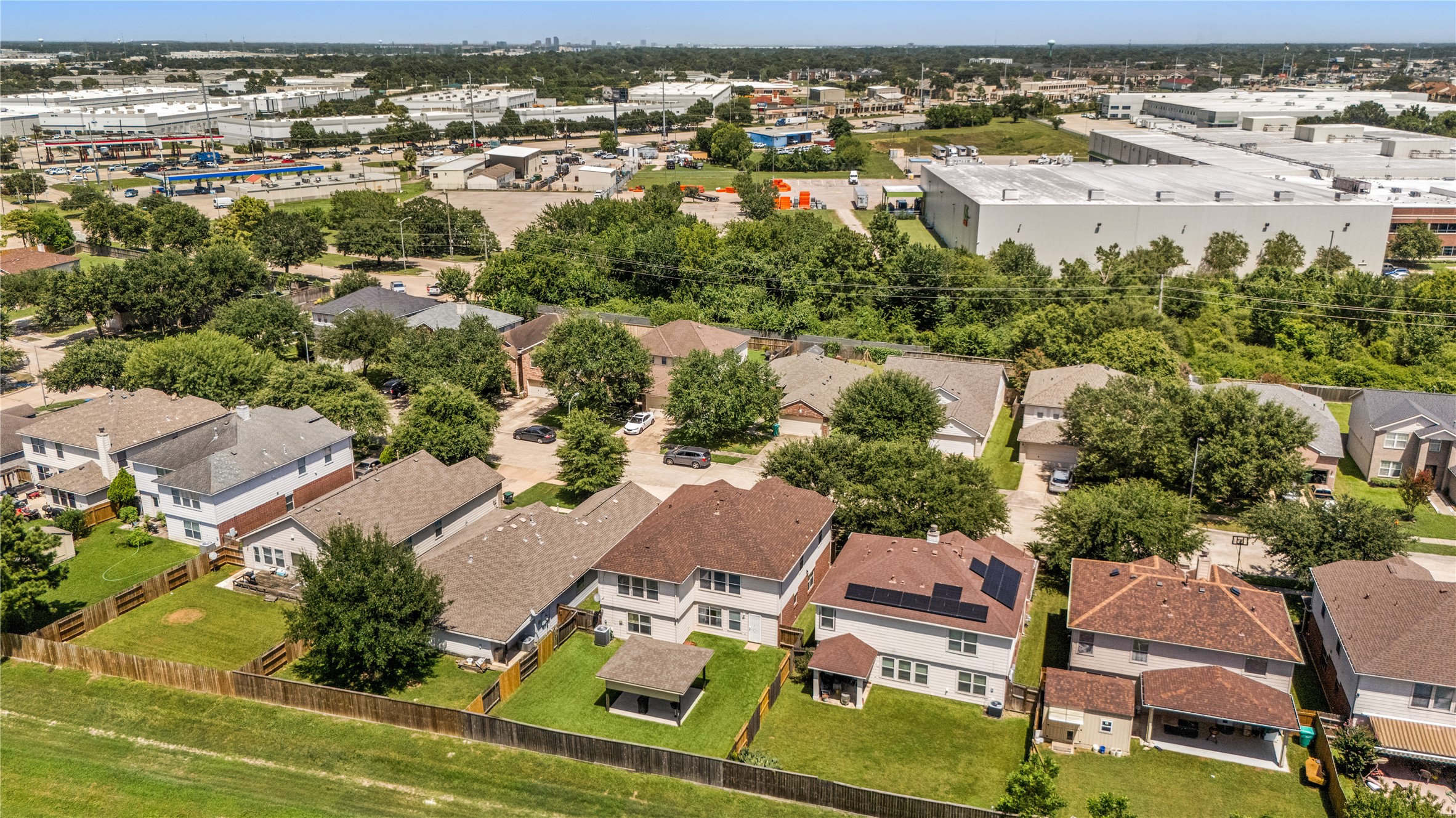 13407 Spring Line Court Houston, TX 77086 - Photo 27 of 29 13407 Spring Line has no back neighbors. The Blue Creek neighborhood is buffered by green space to the commercial/industrial district which houses Amazon (HOU2 Fulfillment Center), Sysco, and Coca-Cola.