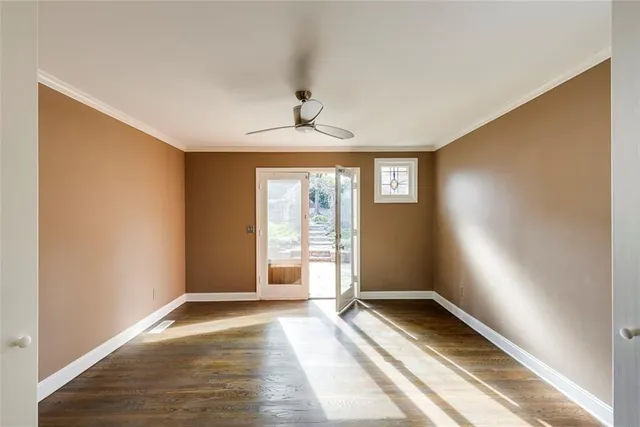a view of an empty room and window