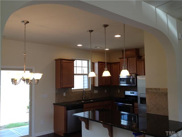 74 Pocono Drive Durham, NC 27705 - Photo 3 of 7 Image from completed Carlisle home in community. Subject unit is under construction.