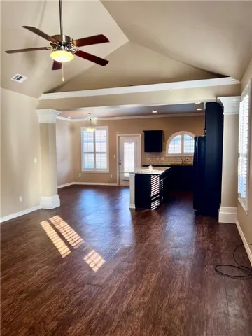 a view of livingroom with hardwood floor and ceiling fan