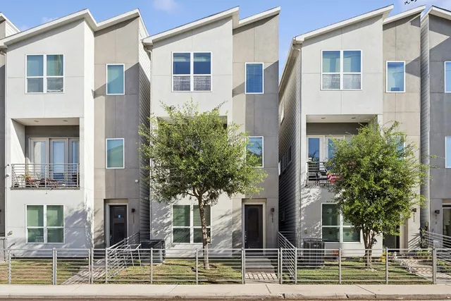 a view of a building with a tree