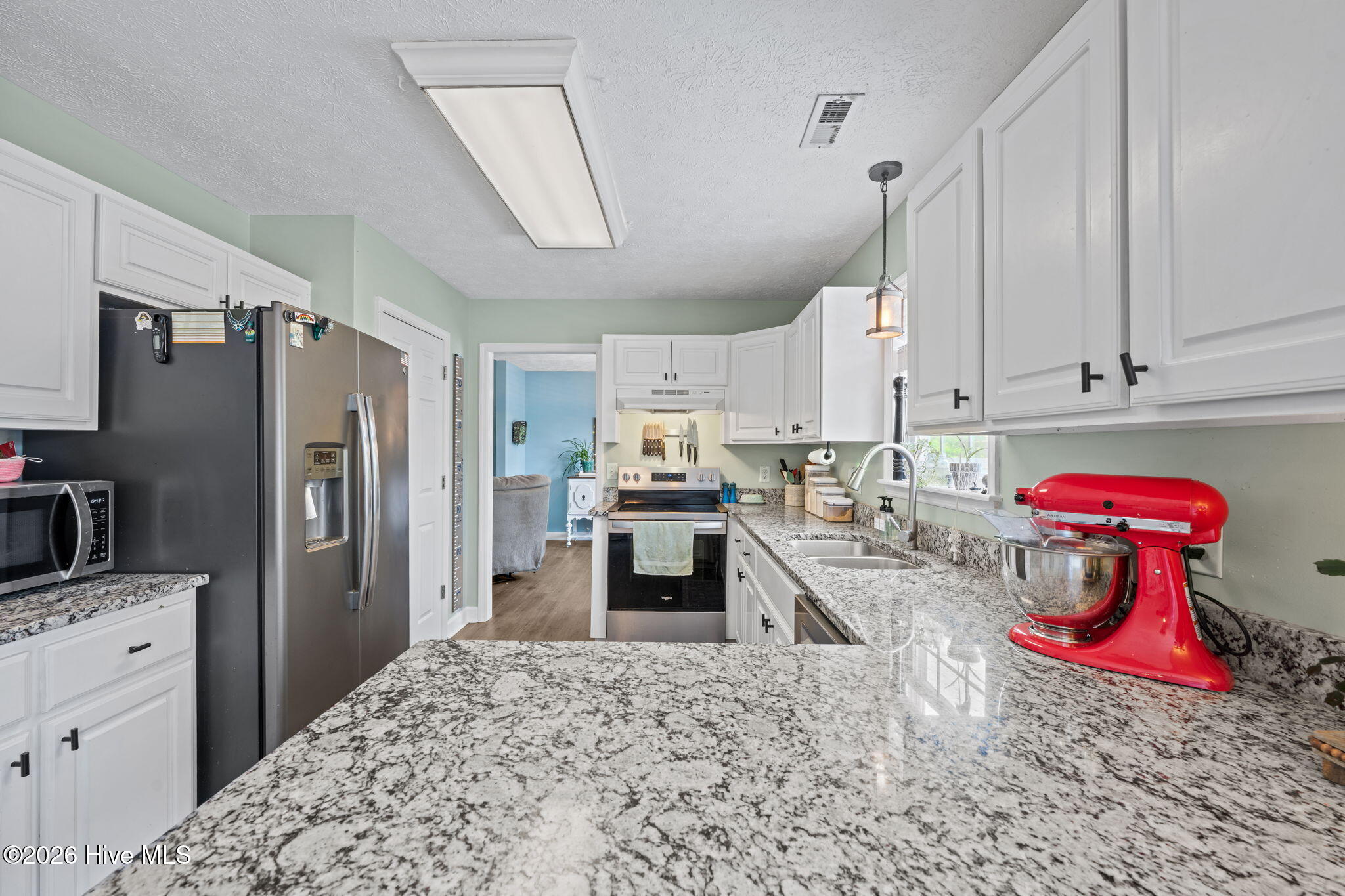 615 Fox Ridge Court Havelock, NC 28532 - Photo 2 of 40 kitchen with granite countertops and stainless steel appliances