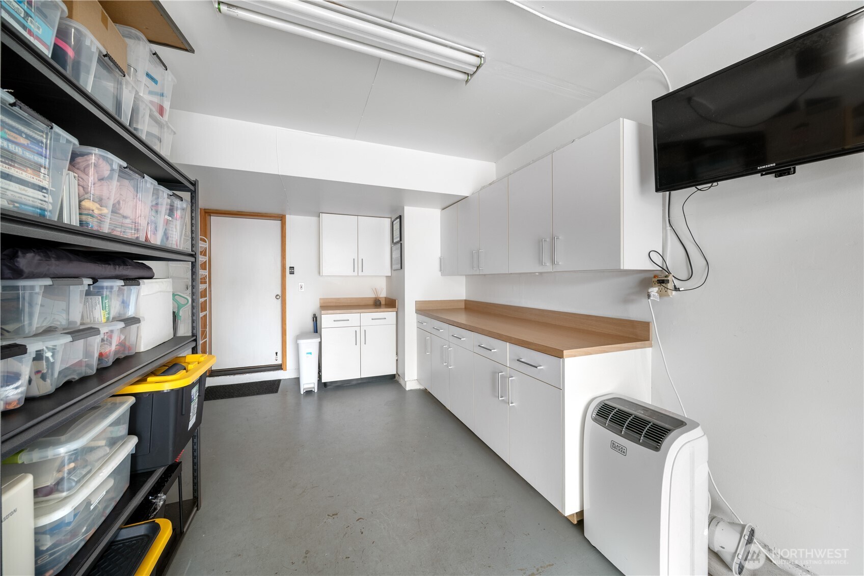1529 201st Place Southeast, Unit 12C Bothell, WA 98012 - Photo 18 of 27 a kitchen with stainless steel appliances a stove a sink and a refrigerator