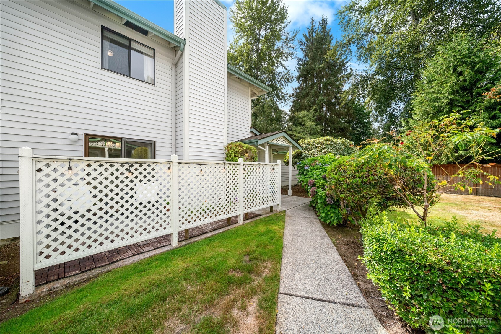 1529 201st Place Southeast, Unit 12C Bothell, WA 98012 - Photo 20 of 27 a house view with a garden space