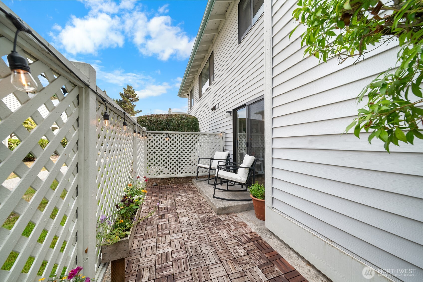 1529 201st Place Southeast, Unit 12C Bothell, WA 98012 - Photo 22 of 27 a view of a house with a bench