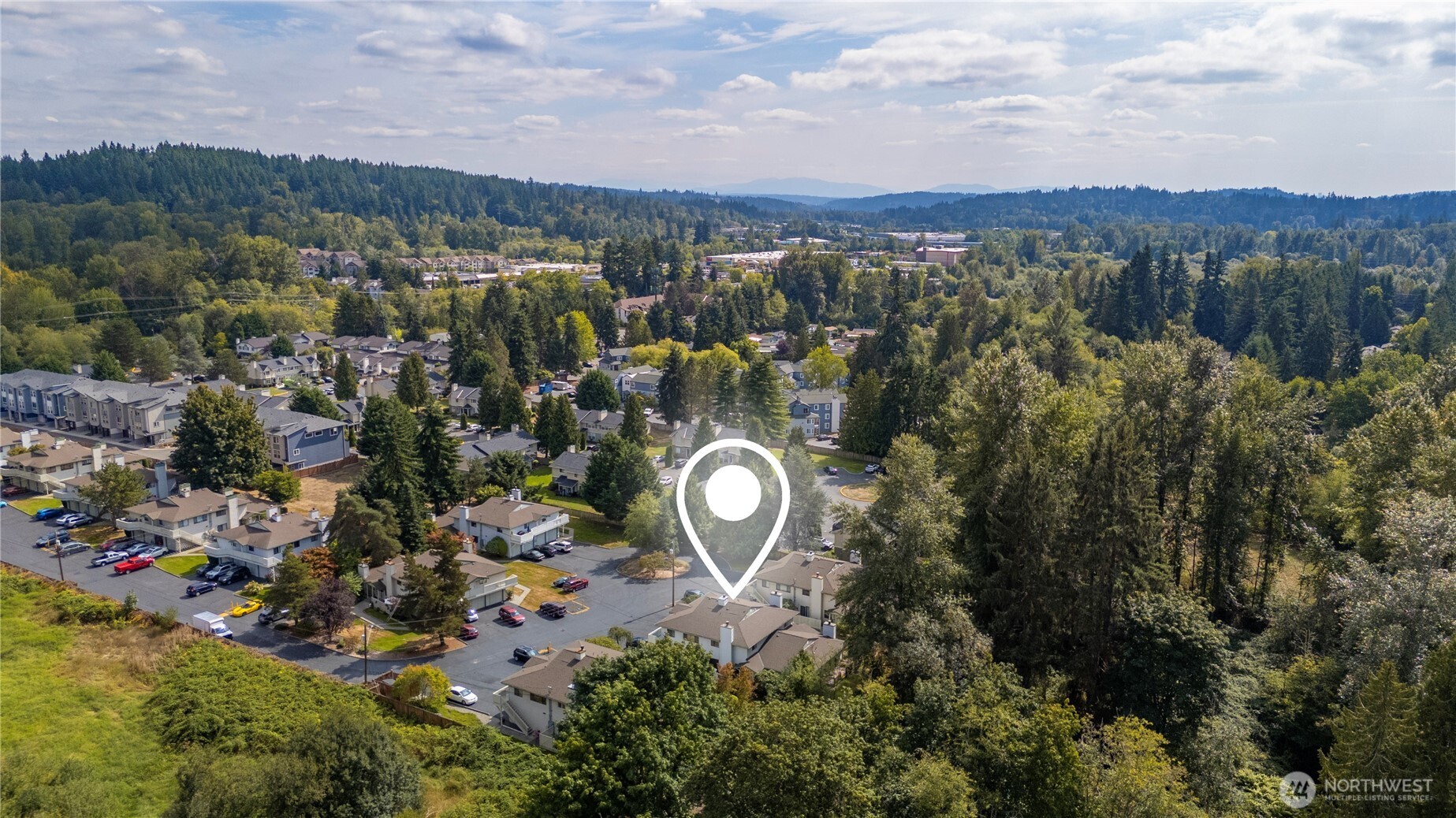 1529 201st Place Southeast, Unit 12C Bothell, WA 98012 - Photo 26 of 27 a view of a city with lush green forest