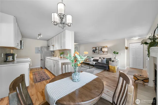 a view of kitchen dining table and chairs