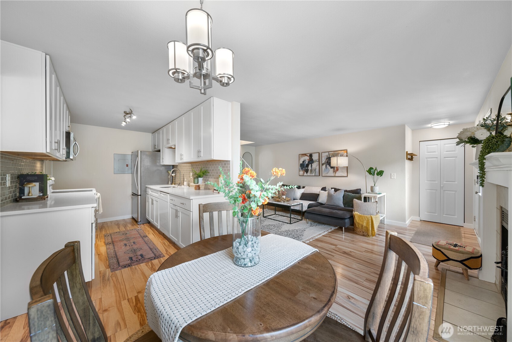 1529 201st Place Southeast, Unit 12C Bothell, WA 98012 - Photo 9 of 27 a view of kitchen dining table and chairs