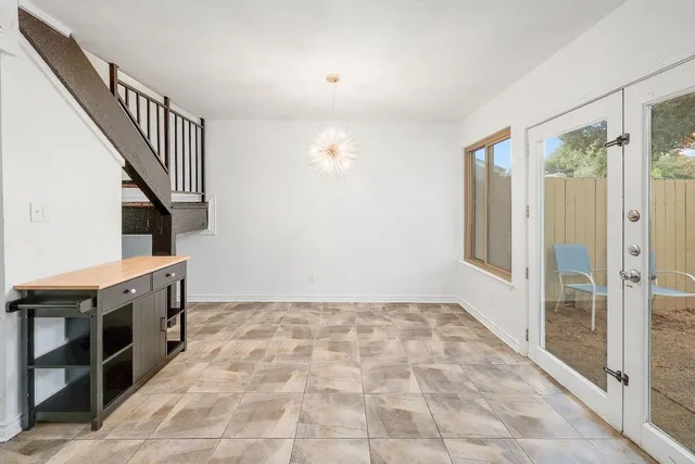 a kitchen with a sink a refrigerator and a sink