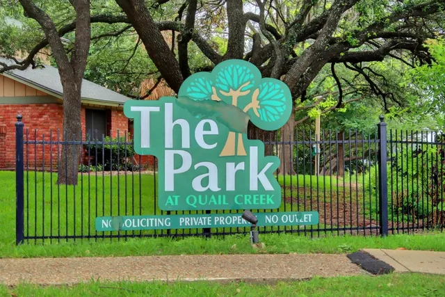 a view of a road with a trees